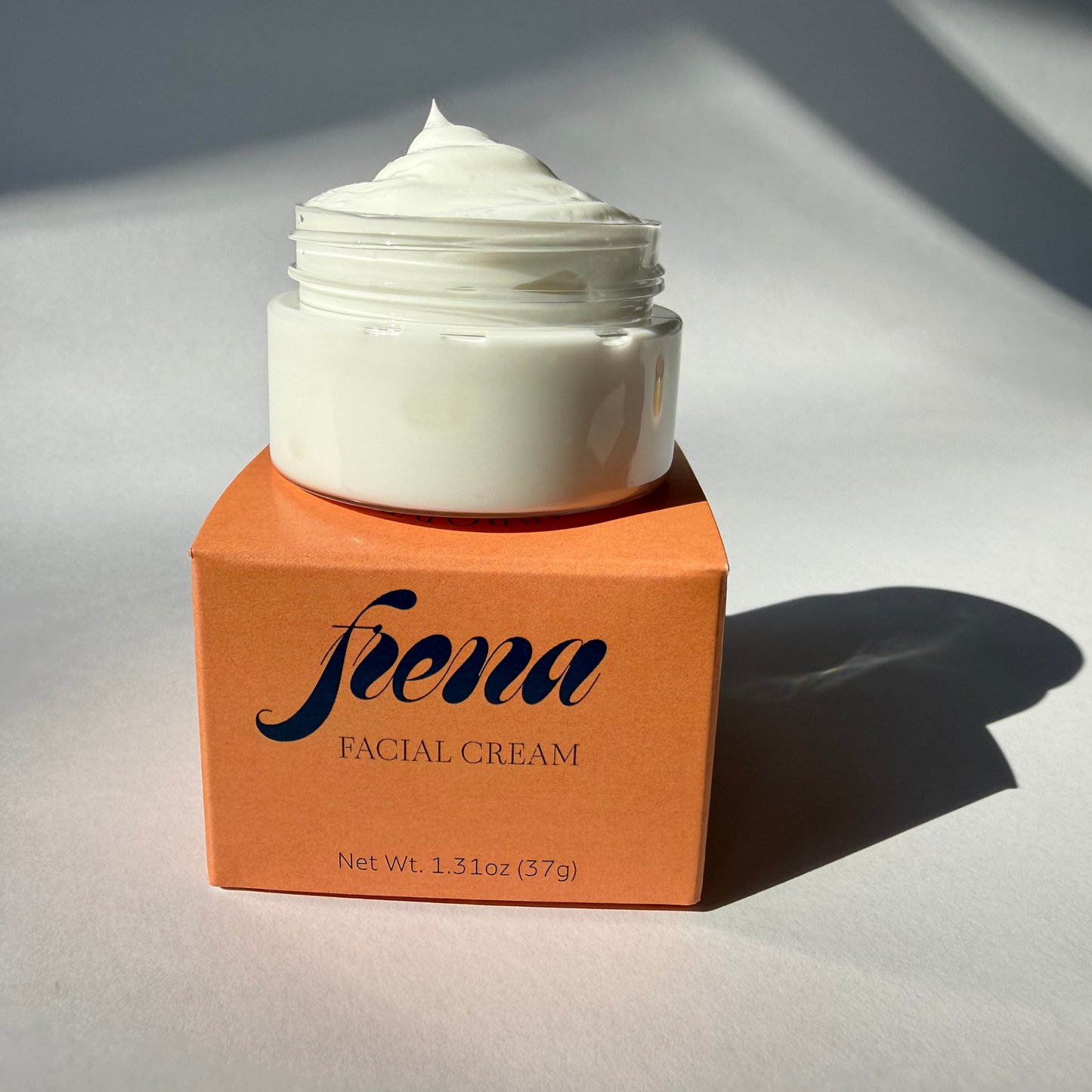 Frena facial cream in light with shadows