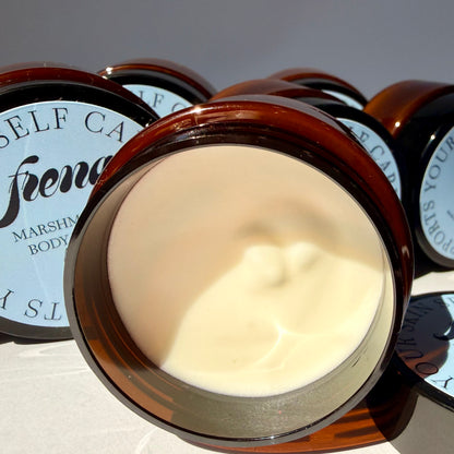 Marshmallow body butter in mini size with lid open